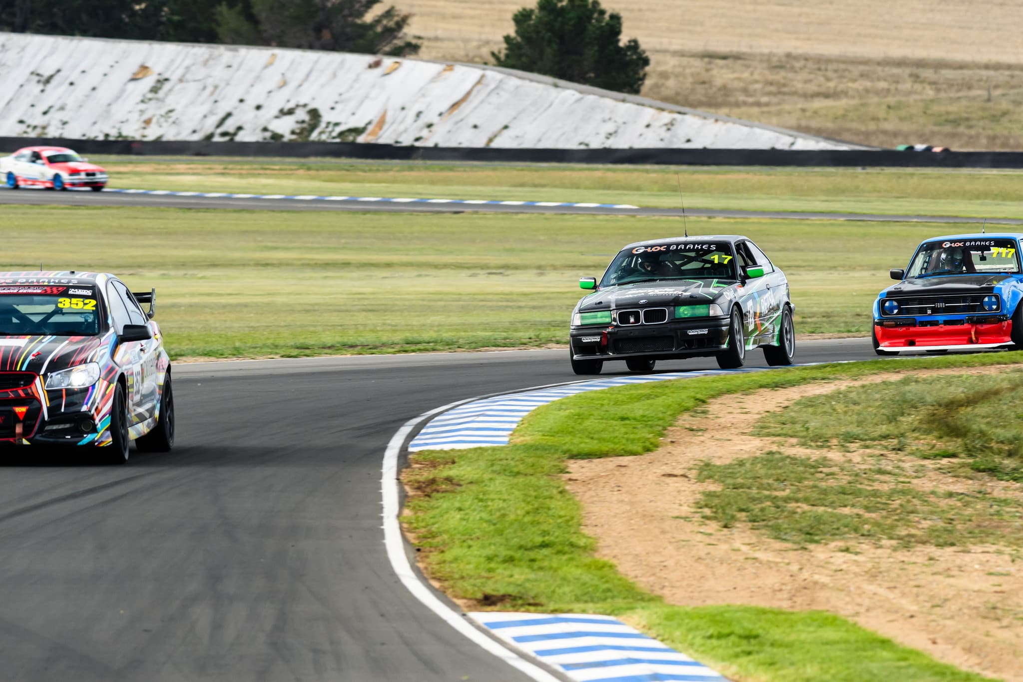 Project E36 navigating a corner at One Raceway