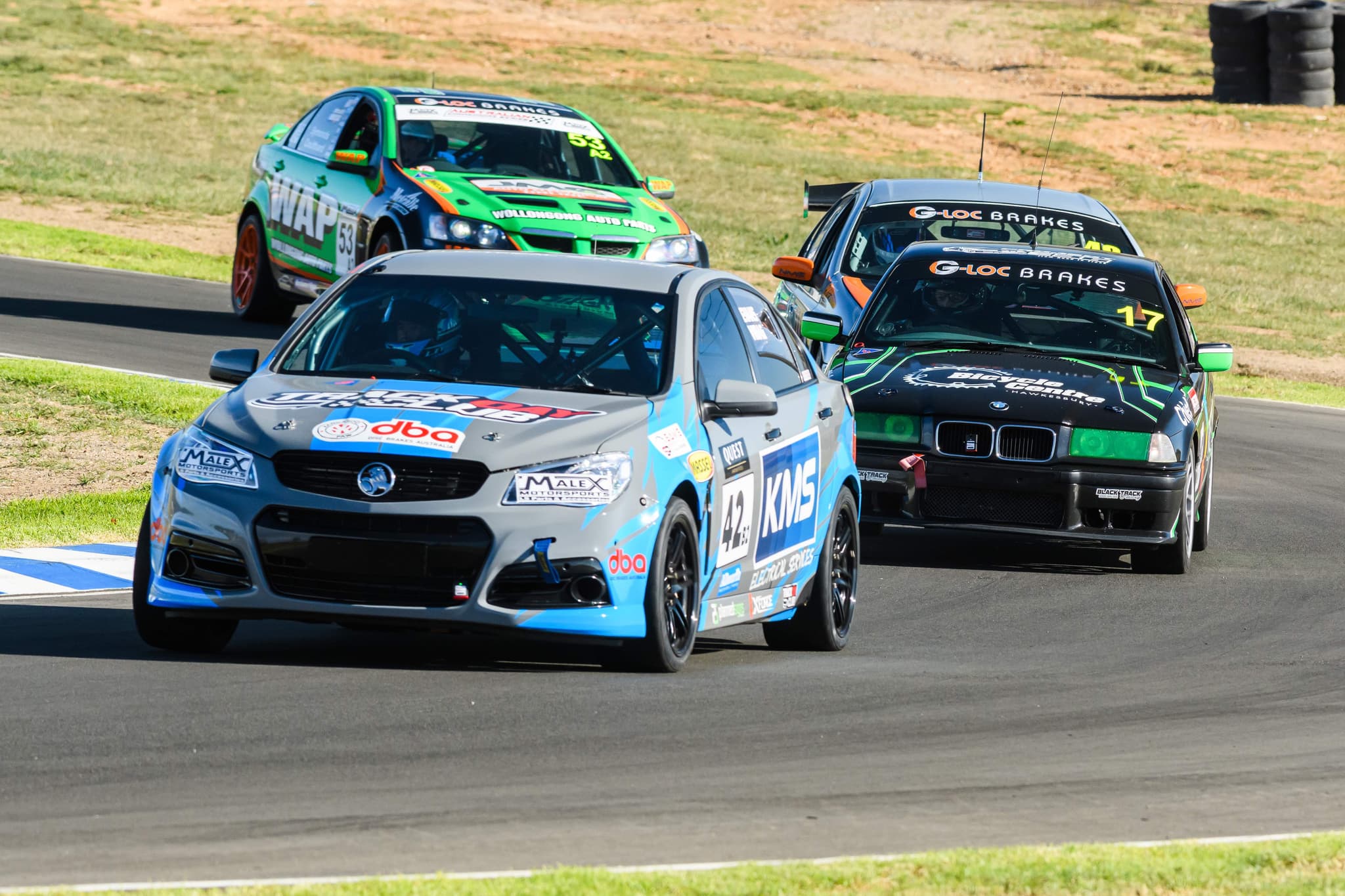 Project E36 in close racing action at One Raceway