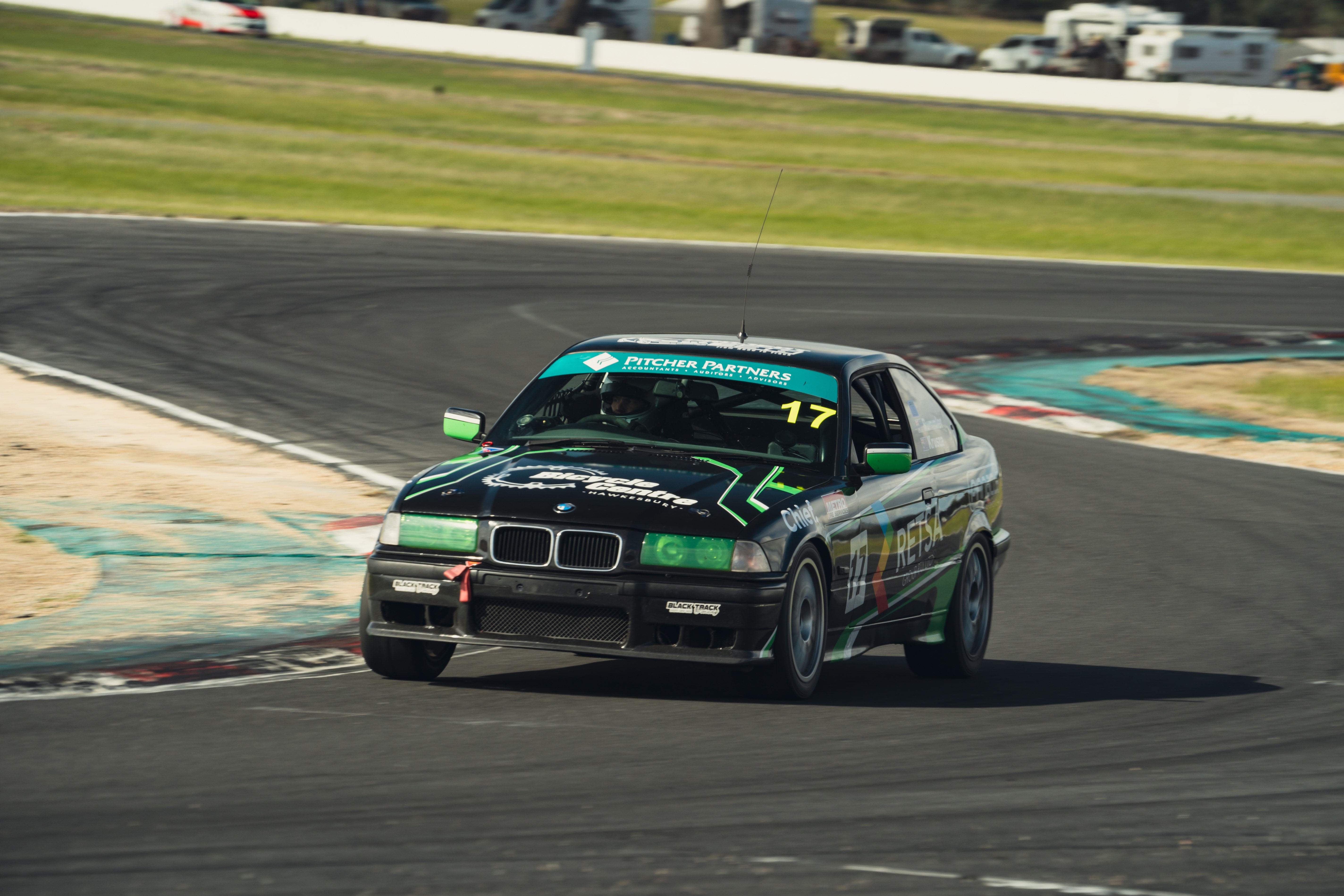 Project E36 racing at full speed on track